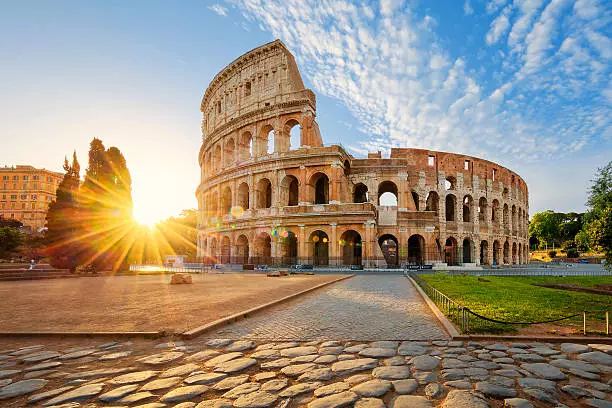 Colosseum in Rome and morning sun, Italy, Europe